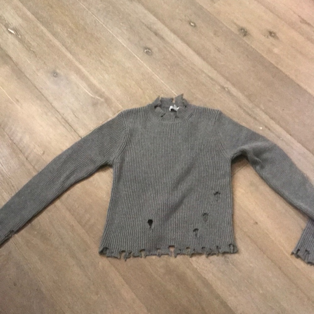 Ripped style oversized sweater